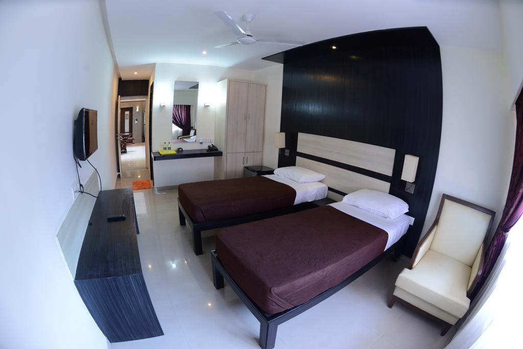 Hotel Ayush International Мангалур Номер фото